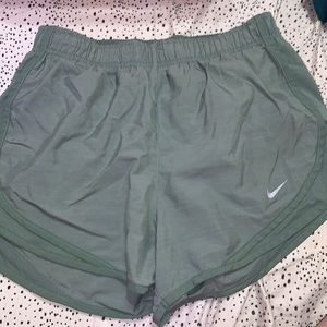 army green nike shorts, size small